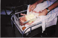  [ Dad changing diapers ] 